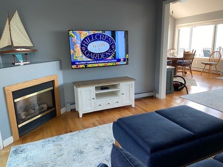 Wellfleet, Lt. Island Cape Cod vacation rental - TV room with TV on the wall and new couch.