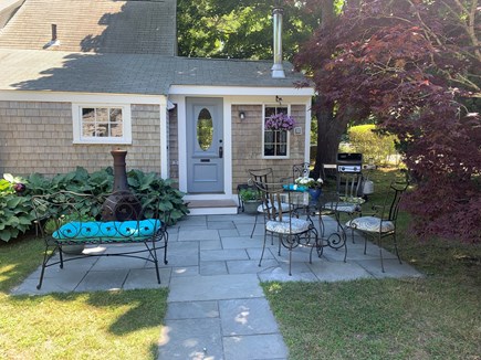 Centerville, Craigville Beach Cape Cod vacation rental - Private patio with a chiminea and Weber gas grill.