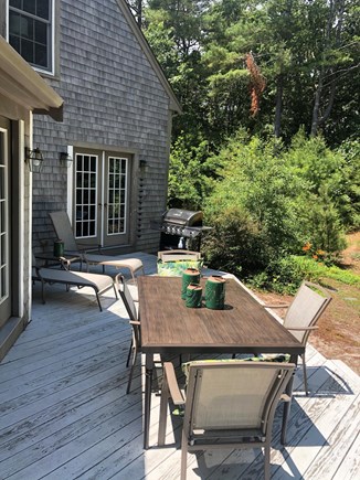 Cotuit Cape Cod vacation rental - Back deck off of kitchen & sunroom