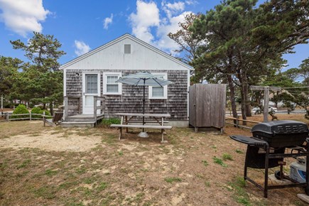 Dennis Port Cape Cod vacation rental - Picnic table with grill and outdoor shower