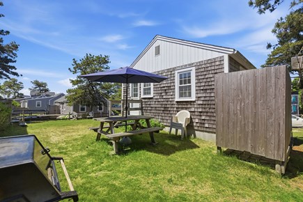 Dennis Port Cape Cod vacation rental - Outdoor area with picnic table, grill and outdoor shower