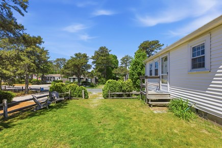 Dennis Port Cape Cod vacation rental - Front yard with shaded sitting area