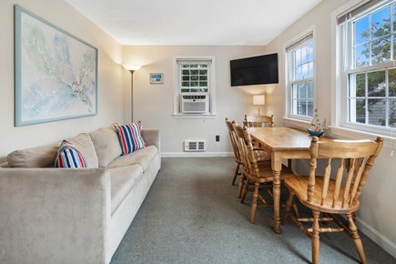 Dennis Port Cape Cod vacation rental - Living room with TV and dining area