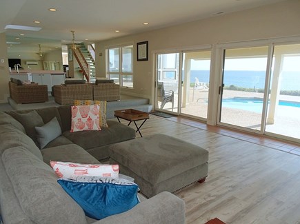 Mashpee, New Seabury Cape Cod vacation rental - Main floor family room with two seating areas and sliders to pool