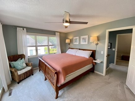 Ocean Edge Resort Cape Cod vacation rental - Primary king bed w/ balcony, full bath, walk in closet, TV