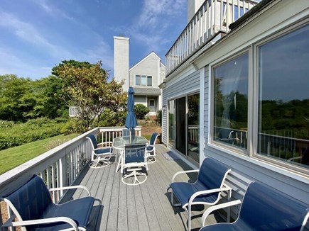 Ocean Edge Resort Cape Cod vacation rental - Deck w/ Blackstone grill, seating for 8, overlooks pond