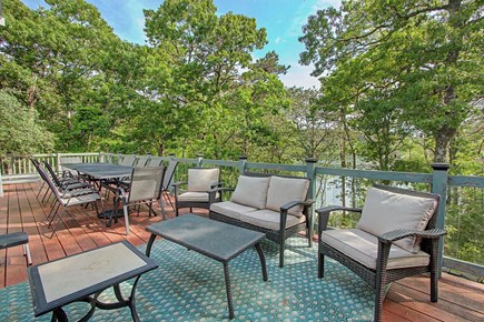 Brewster Cape Cod vacation rental - Patio dining and lounge overlooking Sheep Pond