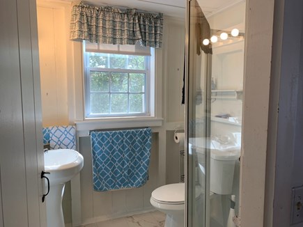 Brewster Cape Cod vacation rental - Bathroom with shower and new medicine cabinet.
