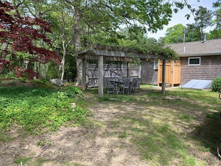 Brewster Cape Cod vacation rental - Out door shower and vine covered dining area!