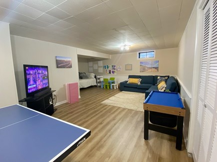 Harwich Cape Cod vacation rental - Finished basement with lounge furniture and indoor games