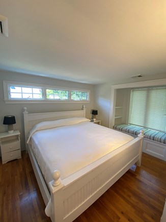 Harwichport Cape Cod vacation rental - Master bedroom with comfortable king size bed, window seat and TV