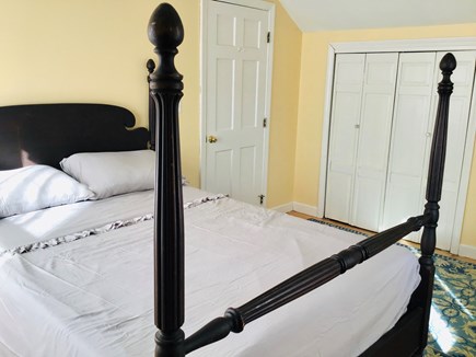 Harwich Cape Cod vacation rental - Sunny yellow full bed bedroom overlooking the garden