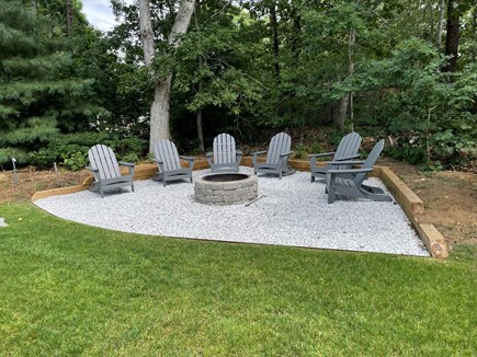 Eastham Cape Cod vacation rental - Firepit with nice Adirondack chairs