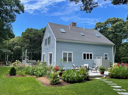 Eastham Cape Cod vacation rental - Patio seating group, outdoor shower and tasteful landscaping