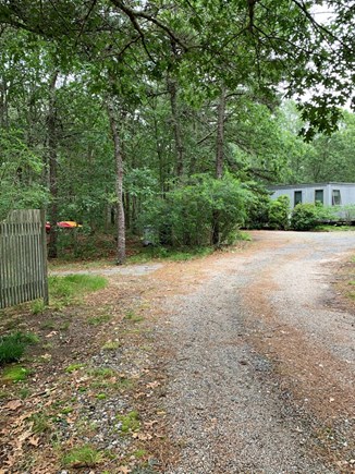 Truro Center, off Castle Road Cape Cod vacation rental - C/S: View of house, cottage/studio to the left