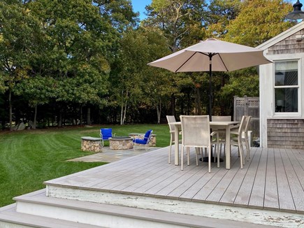 East Orleans Cape Cod vacation rental - Deck looking toward yard and fire pit