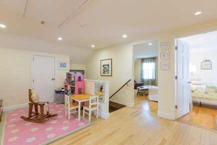 Eastham Cape Cod vacation rental - Upstairs hallway with play area. Additional den in  background.