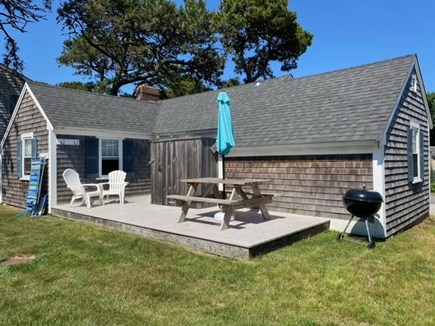 Dennis Port Cape Cod vacation rental - Outdoor shower, charcoal grill, dining area