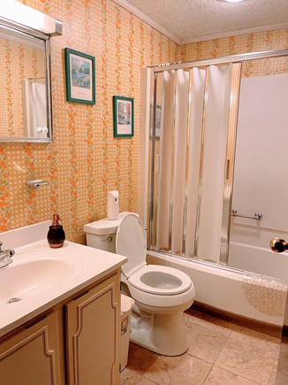 in East Falmouth, waterfront  Cape Cod vacation rental - Bathroom with bath tab, marble floor