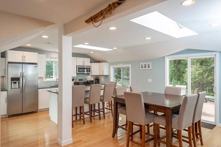 Eastham Cape Cod vacation rental - Open concept kitchen / dining / living with access to back porch