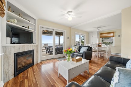 East Sandwich Cape Cod vacation rental - Bright living room with gas fireplace and magnificent views