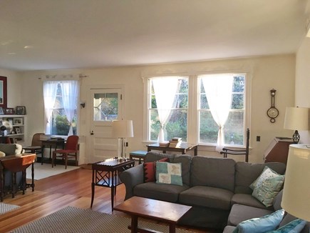 Woods Hole, Quissett Harbor Cape Cod vacation rental - The main living room seating area has a comfy sectional sofa.