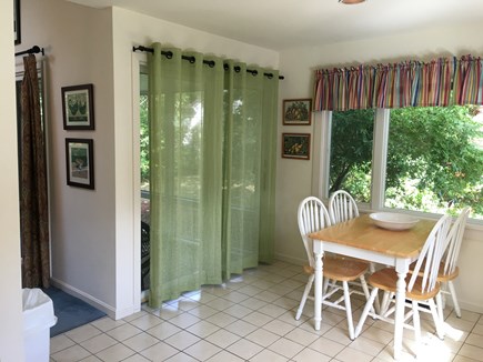 Brewster, Sears Point Community Cape Cod vacation rental - Kitchen Dining Area and view to Screened in Porch