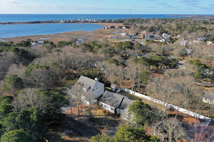 West Yarmouth (Seagull Beach) Cape Cod vacation rental - Drone view of home with beach in the distance.