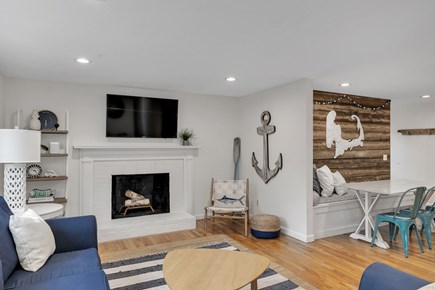 Dennis Cape Cod vacation rental - Living room with wood burning fireplace and Smart TV.