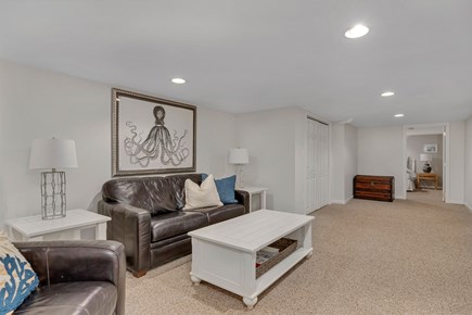 Dennis Cape Cod vacation rental - Basement living area has TV, mini fridge and a Peloton.
