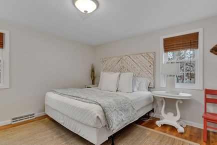 Dennis Cape Cod vacation rental - Master bedroom has King bed, en suite bathroom, TV and closet.