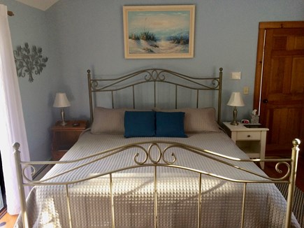 Wellfleet Cape Cod vacation rental - Master bedroom with sitting area leading to the wrap around deck