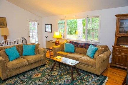 Wellfleet Cape Cod vacation rental - Cathedral ceiling living room with window A/C