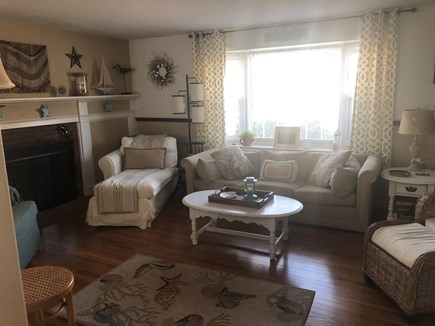 Falmouth, Maravista Cape Cod vacation rental - Living room with FP, TV cable, WIFIbooks, games, puzzles, galore