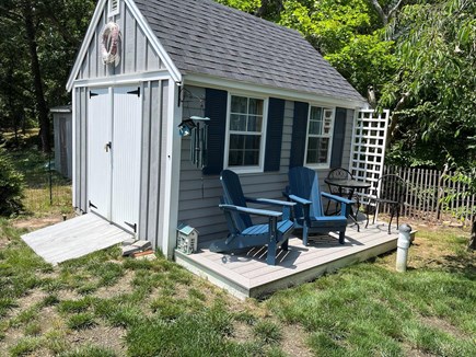 Dennis Cape Cod vacation rental - Outdoor shed with beach chairs, umbrellas and outdoor toys.