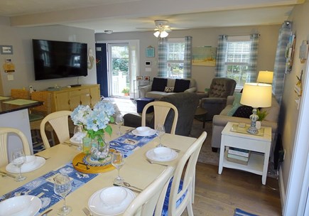 Dennis Cape Cod vacation rental - Dining room, adjacent to kitchen, slider to back deck and patio 