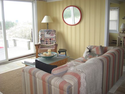 West Dennis Cape Cod vacation rental - Sitting room with slider to back deck