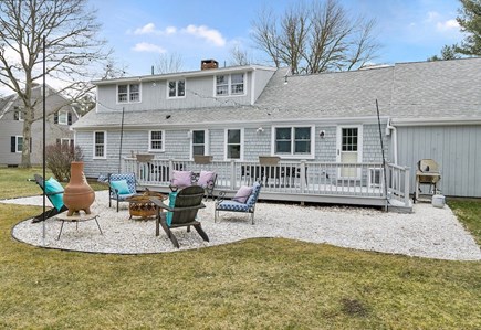 East Falmouth Cape Cod vacation rental - Large backyard with firepit and hammock (new photo coming soon).