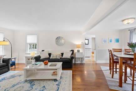 East Falmouth Cape Cod vacation rental - Spacious living room, with dining area off to the side - seats 8.
