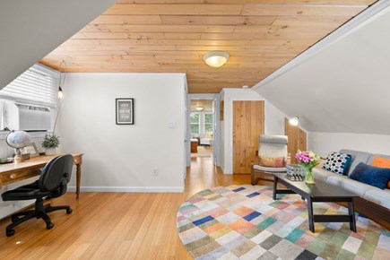East Falmouth Cape Cod vacation rental - Upstairs sitting area with TV and desk.