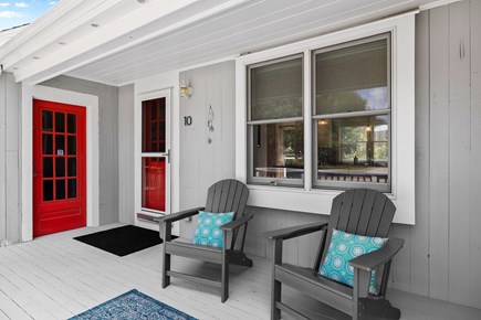 East Falmouth Cape Cod vacation rental - Lounge in Adirondack chairs on the front deck!