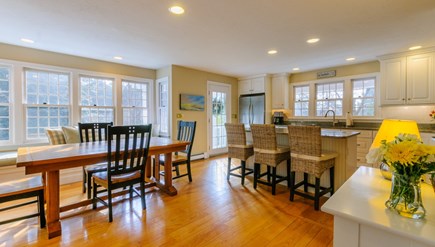East Sandwich Cape Cod vacation rental - Dining table in Kitchen features a window seat