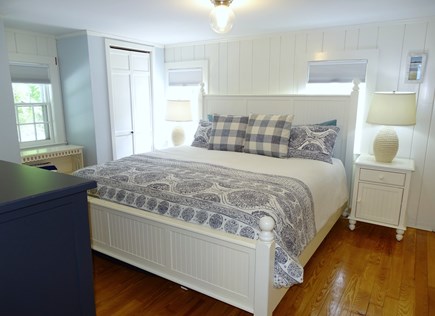 Bass River, West Dennis Cape Cod vacation rental - Master bedroom w king bed, TV, private bath