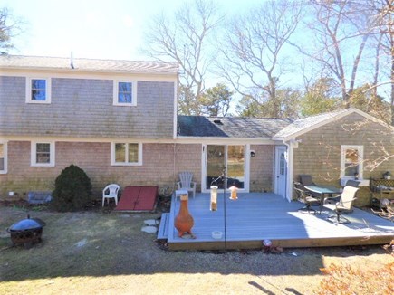 Yarmouthport Cape Cod vacation rental - Back yard deck (new deck furniture stored in garage for now)