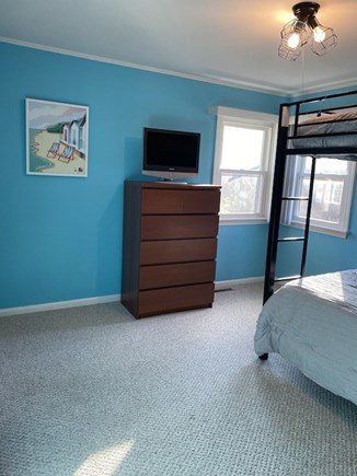 Falmouth Cape Cod vacation rental - Television and dresser in room with bunk bed
