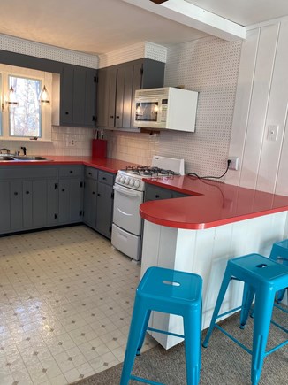 Falmouth Cape Cod vacation rental - Kitchen with full size refrigerator, microwave, oven and Keurig.