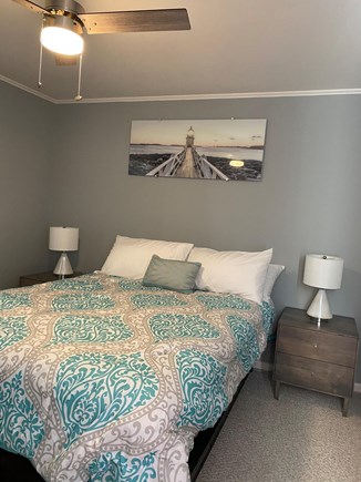Falmouth Cape Cod vacation rental - Bedroom with queen size bed and drawers on the bottom of the bed