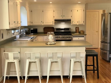 Cotuit Cape Cod vacation rental - Eat in kitchen w/ new stainless appliances
