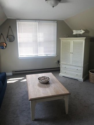 Eastham Cape Cod vacation rental - Upstairs loft room armoire with cable/smart TV.