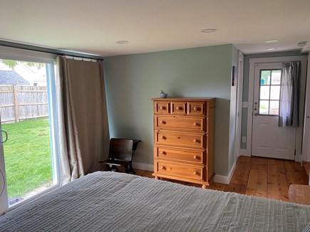 South Yarmouth Cape Cod vacation rental - Master (queen bed) w/ slider to the backyard and private bathroom